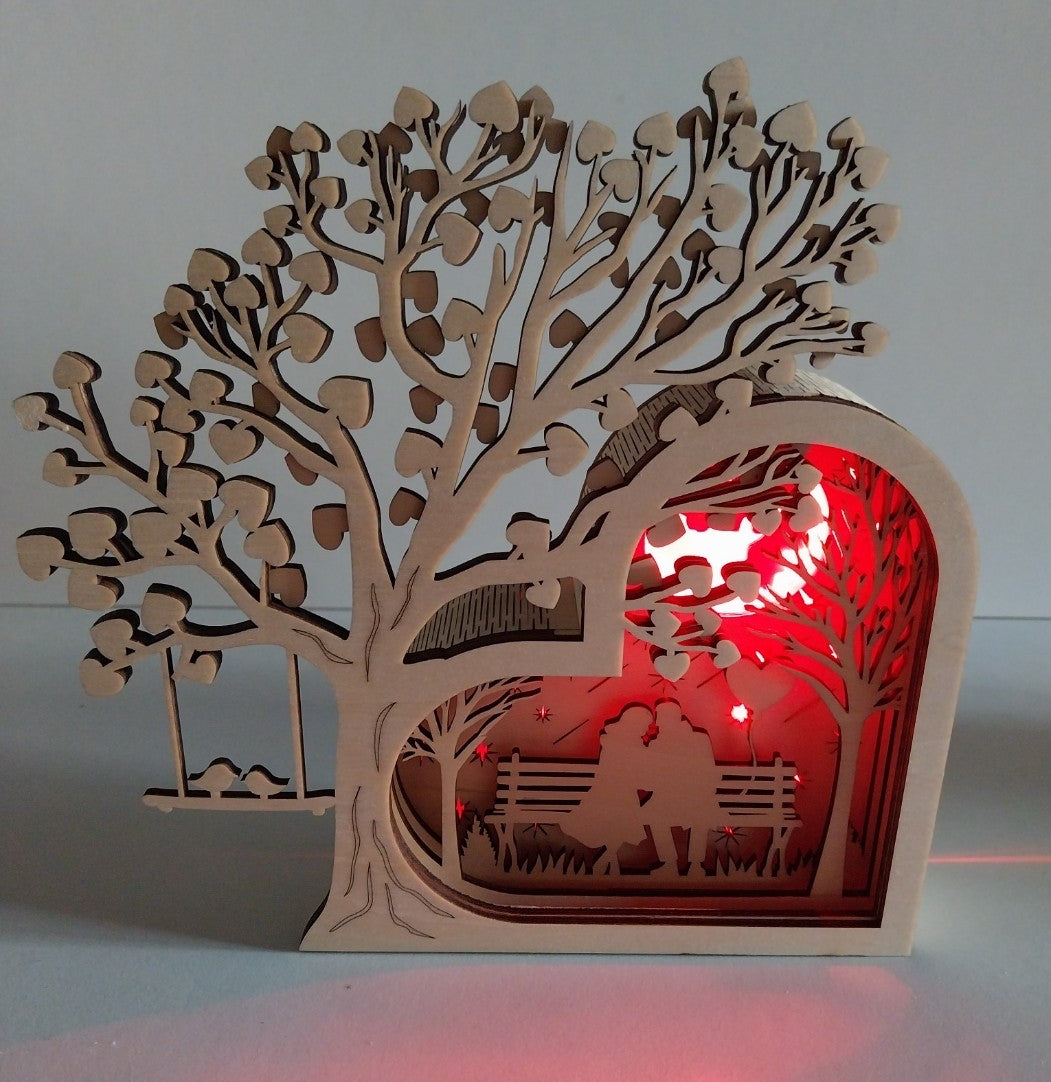 coeur avec couple sur banc avec leds